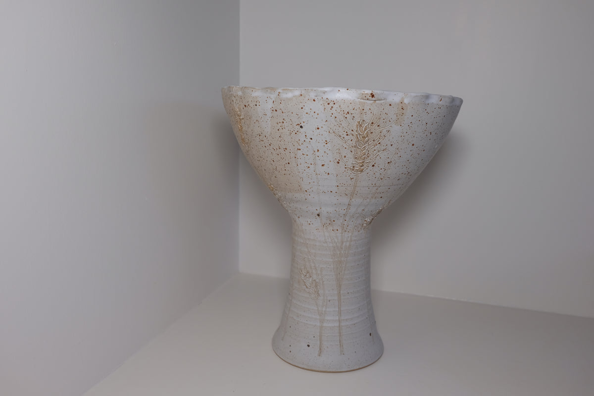 big ikebana vase on feet