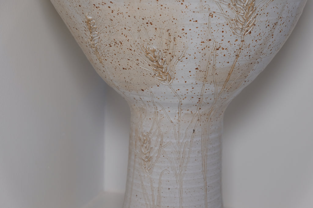 big ikebana vase on feet