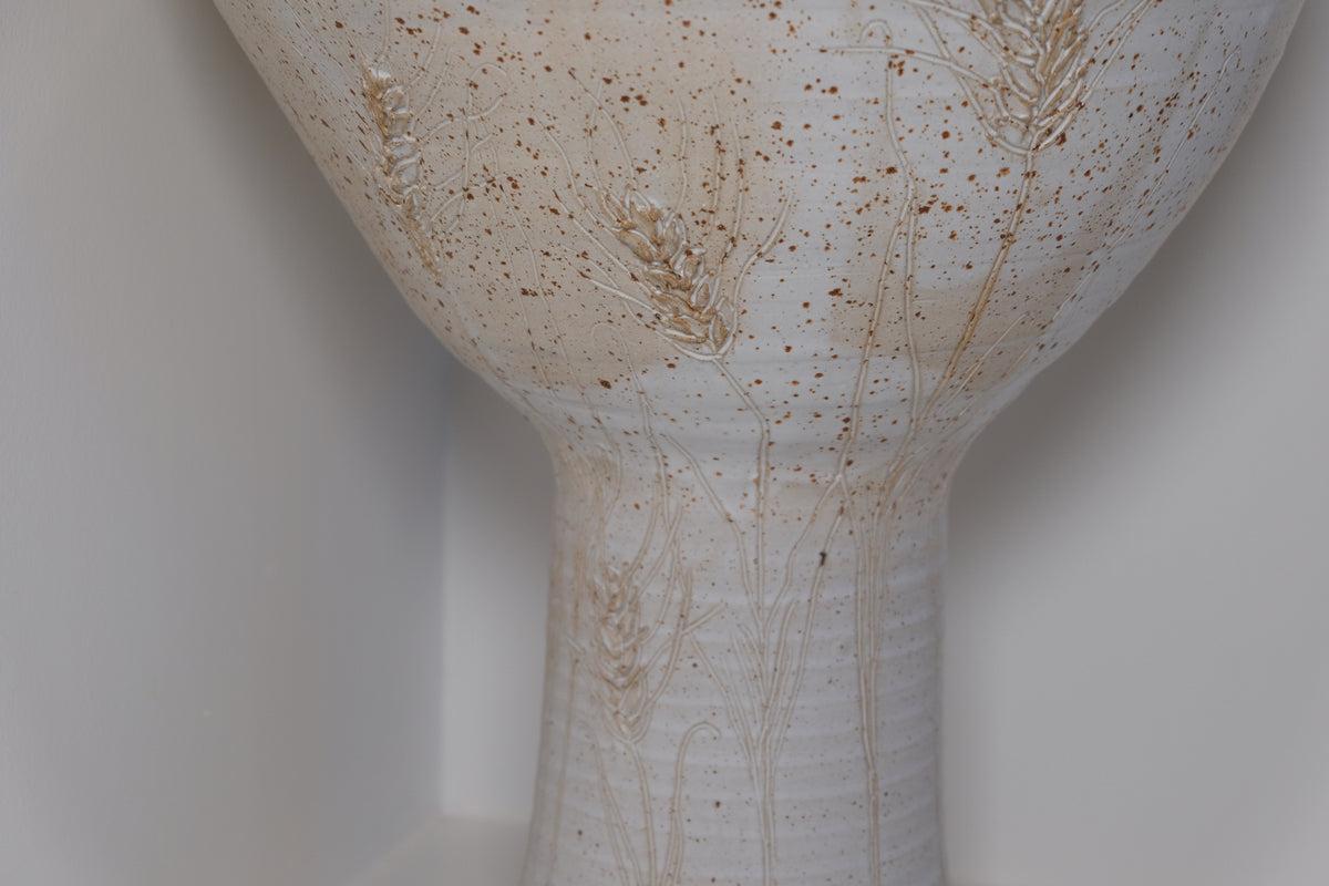 big ikebana vase on feet