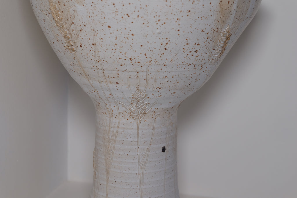 big ikebana vase on feet