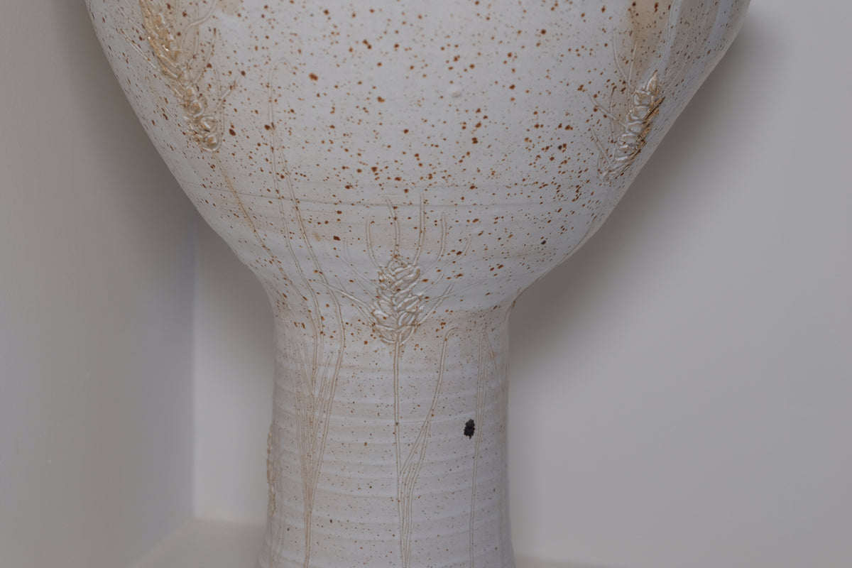 big ikebana vase on feet