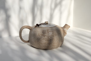 teapot with leather detail