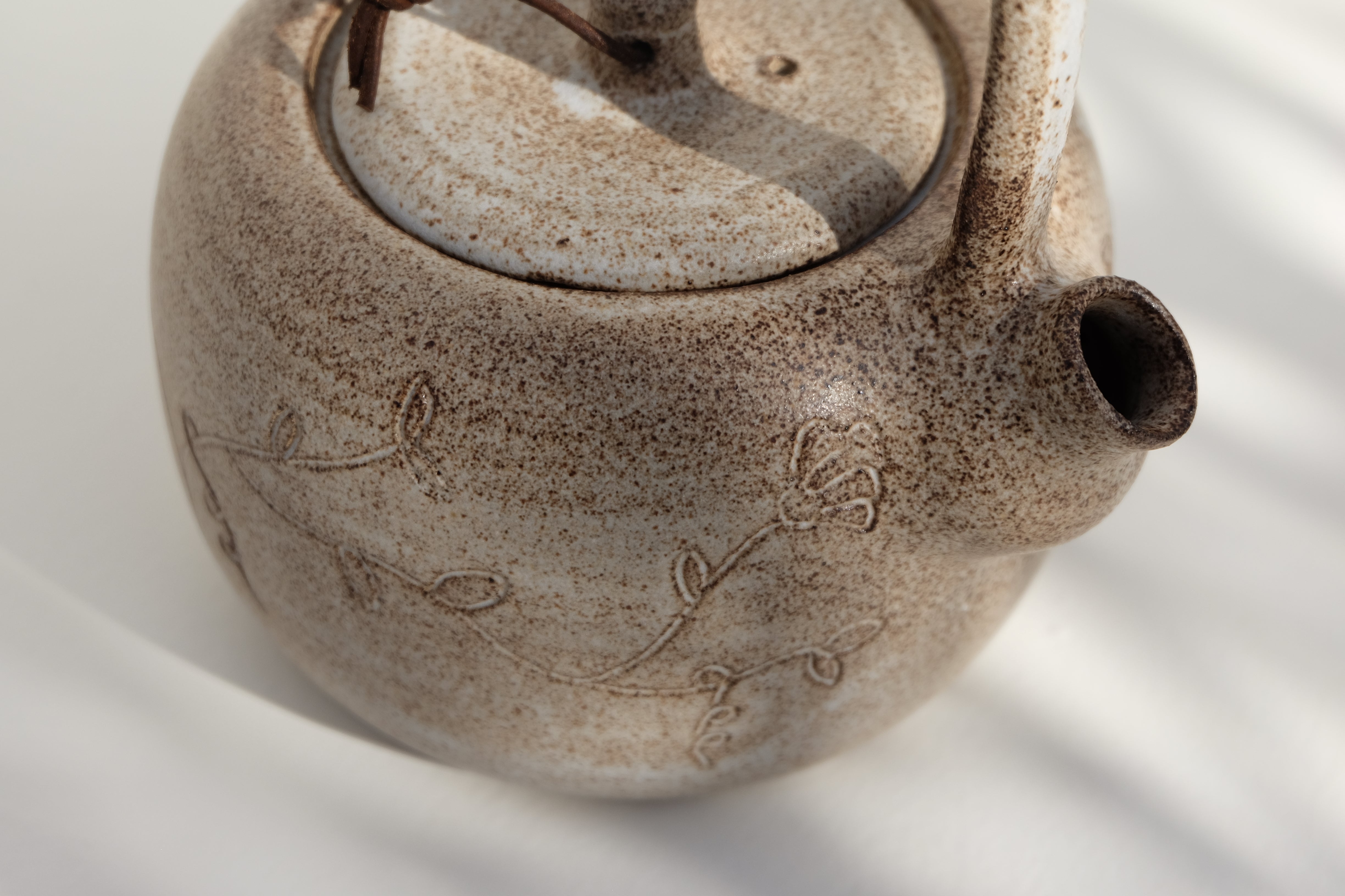 teapot with leather detail