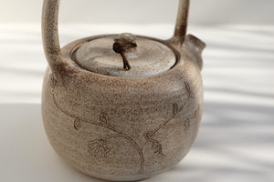 teapot with leather detail